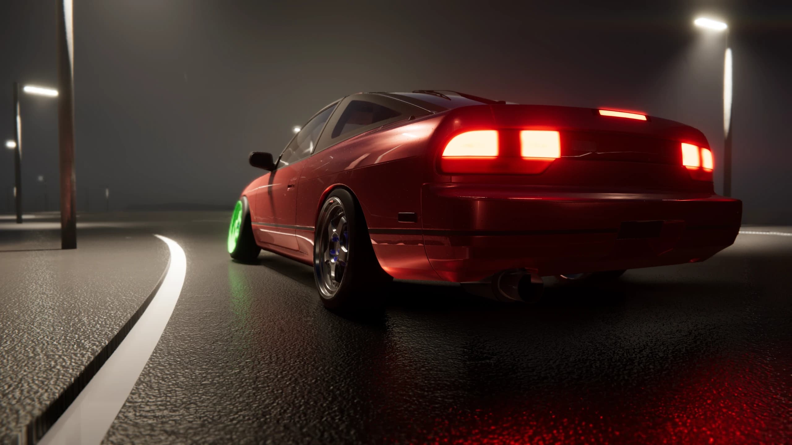Red coupe photographed from behind on a wet road at night