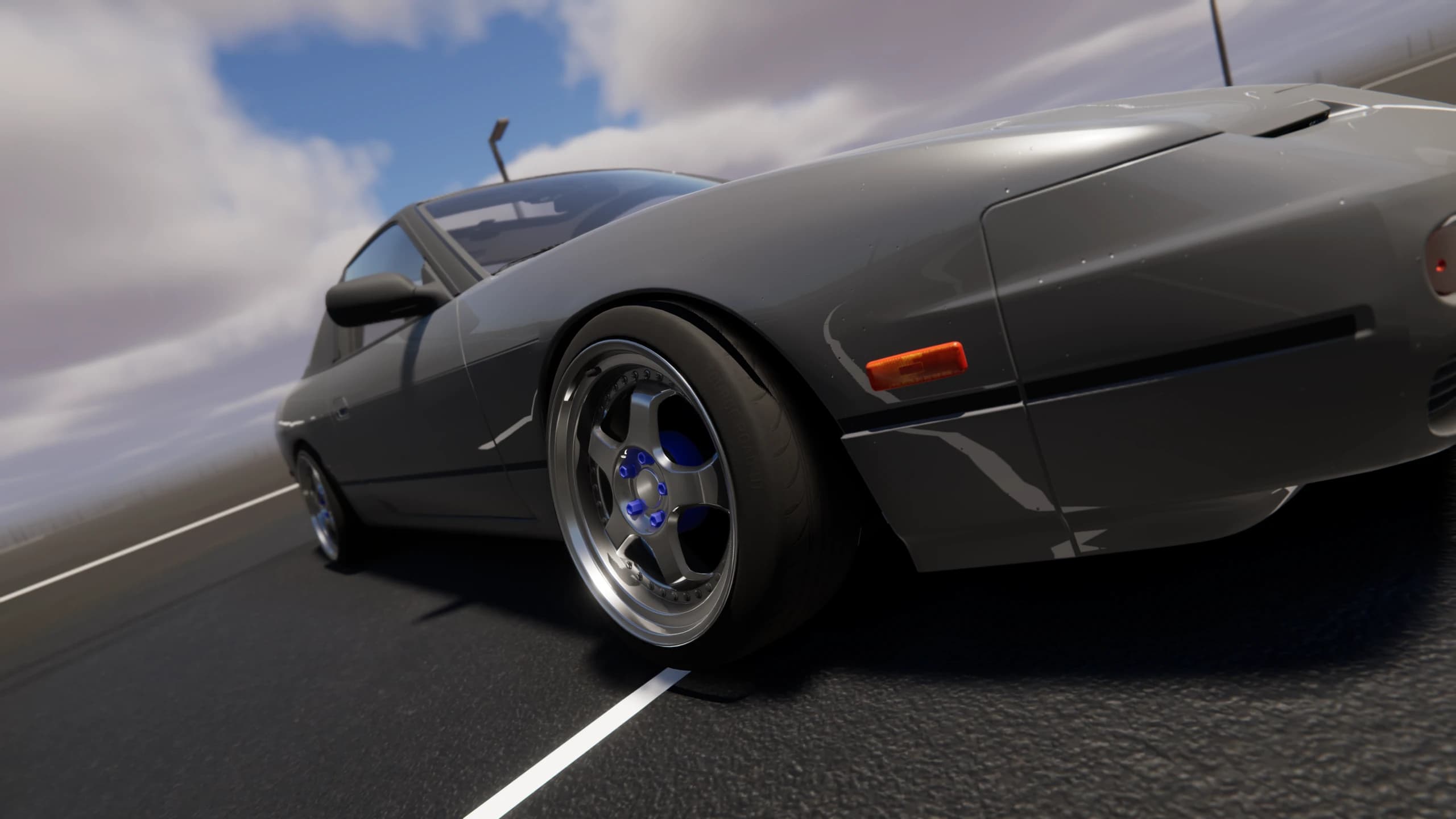 Low in-game view of a Project Tourge car driving on an open road