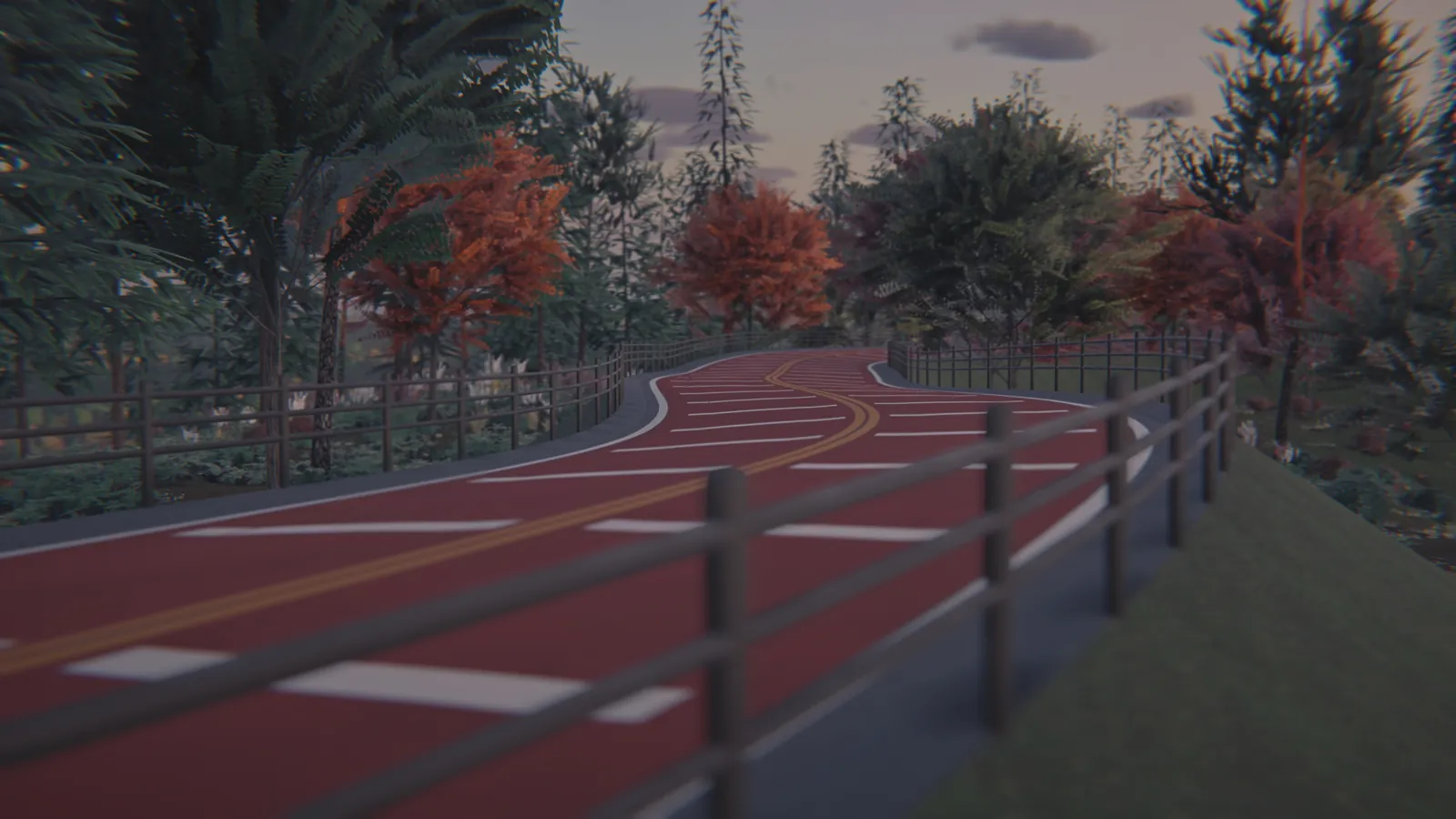 Red road bending beside a wooden fence, with autumn trees on the left